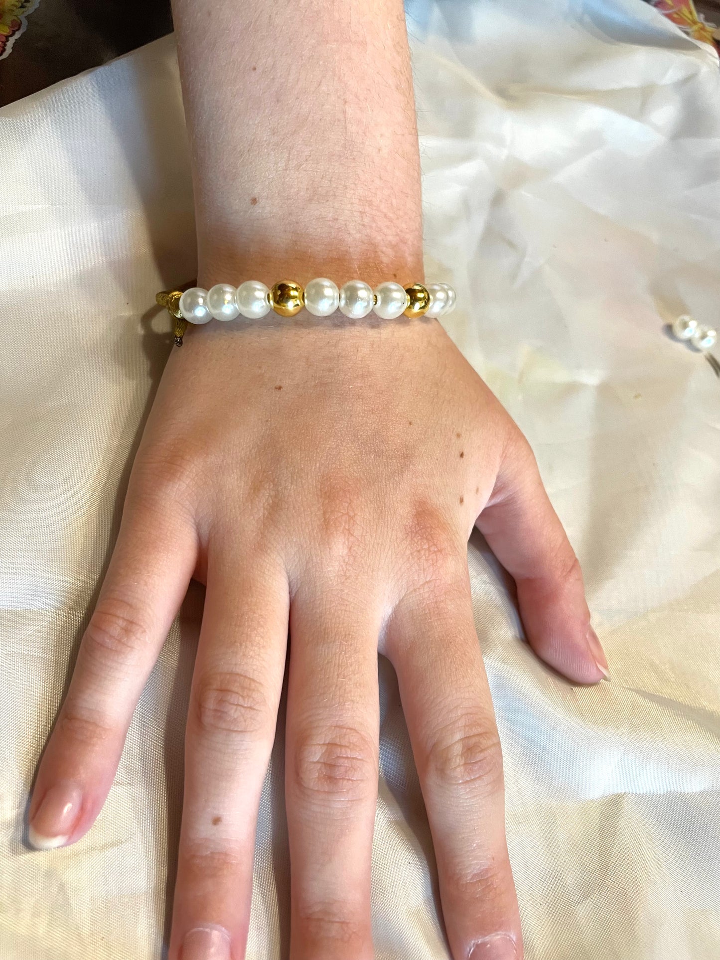 Bracciale fatto a mano perline colore oro e Bianco
