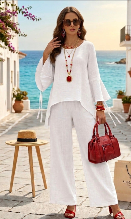 Completo donna set con pantalone a palazzo bianco, abbinato alla borsa rossa Coconuda 