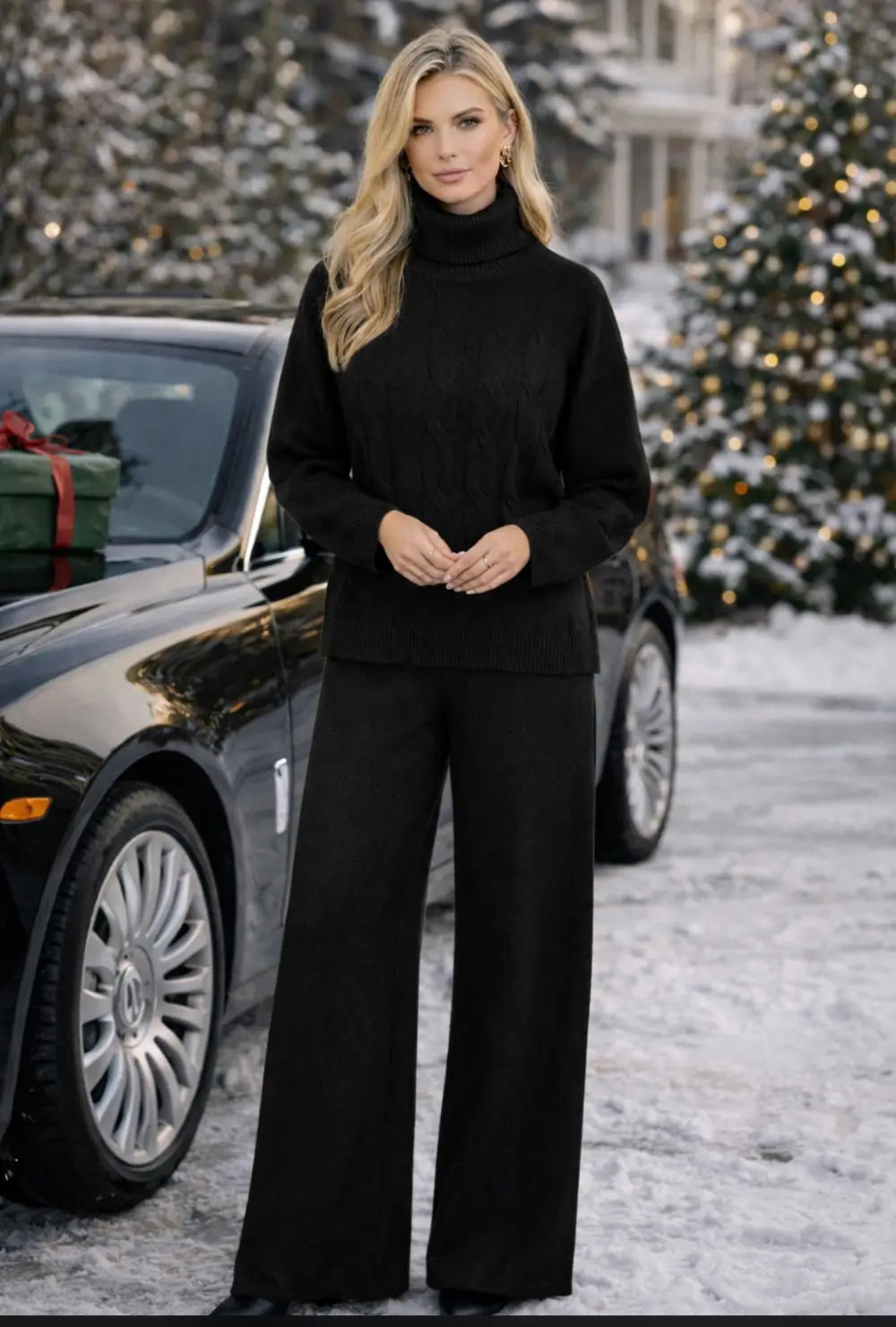 Tuta donna in lana rasata completo maglia collo alto trecce e pantaloni a palazzo nero