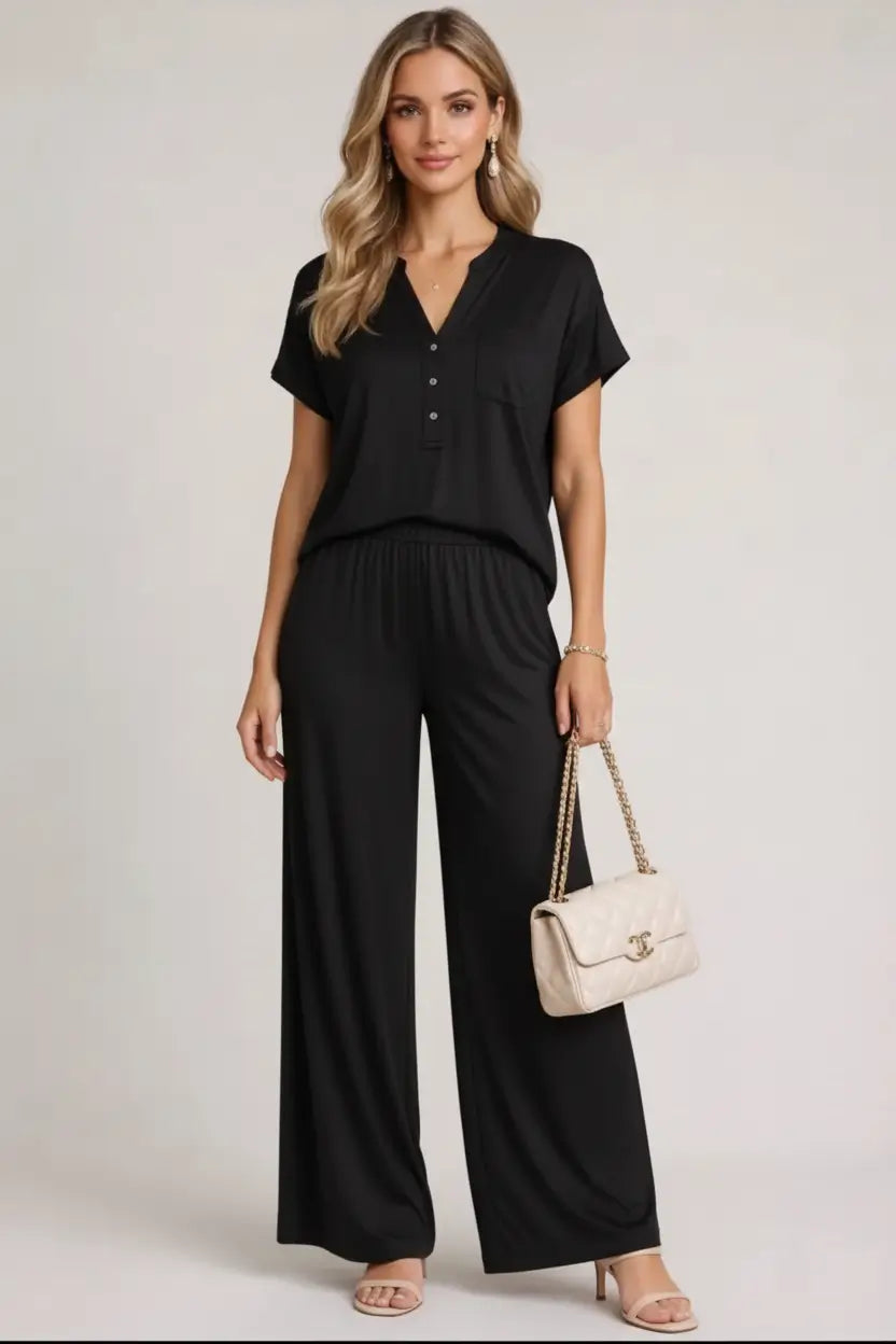 Tuta donna nero completo maglia e pantaloni a palazzo